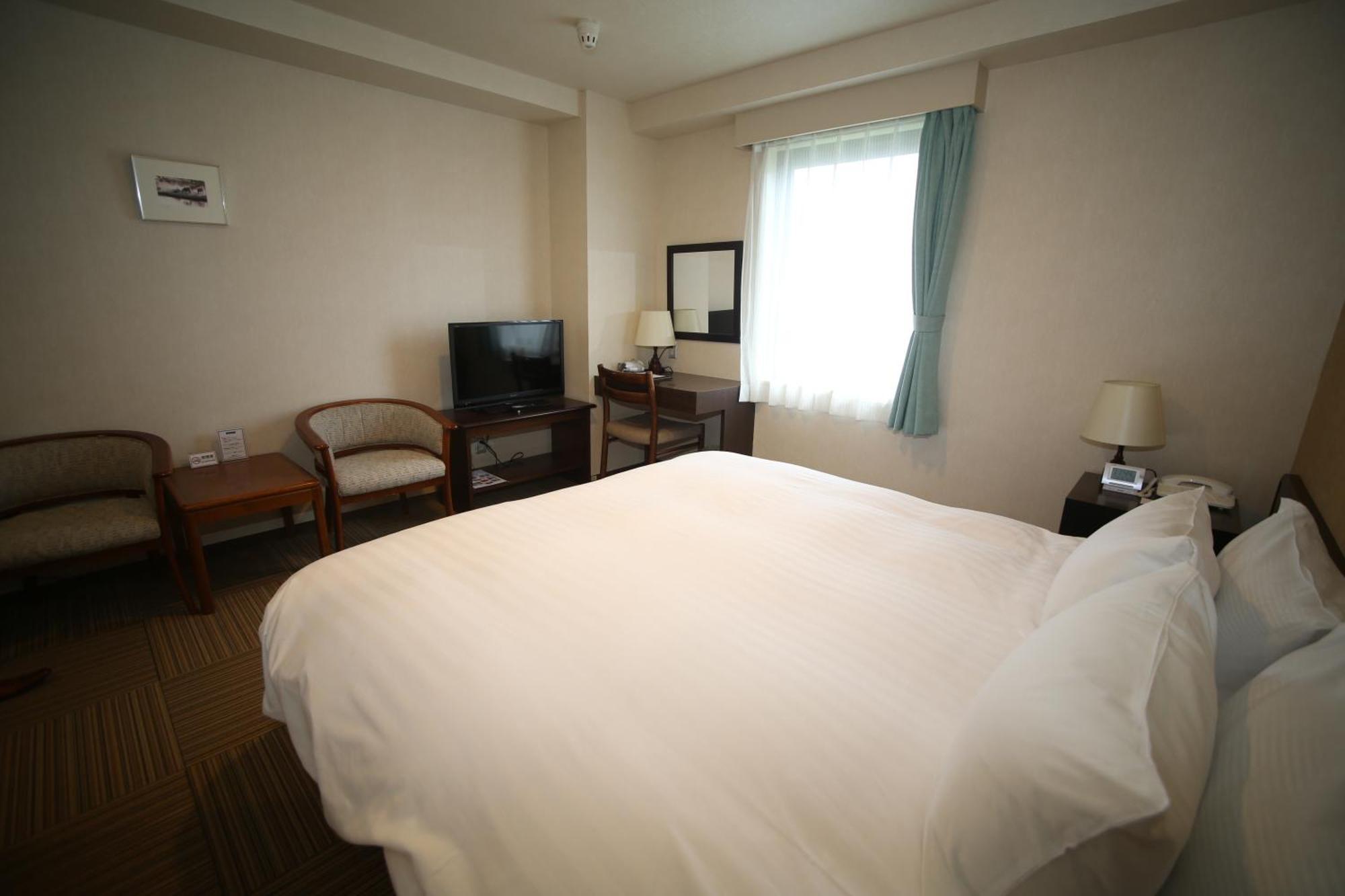 Shizunai Eclipse Hotel Shinhidaka Habitación foto